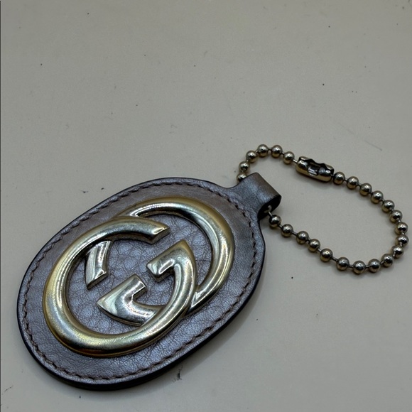 Gucci tan ishLeather Oval Double G Key Ring with Gold Logo bag charm keychain